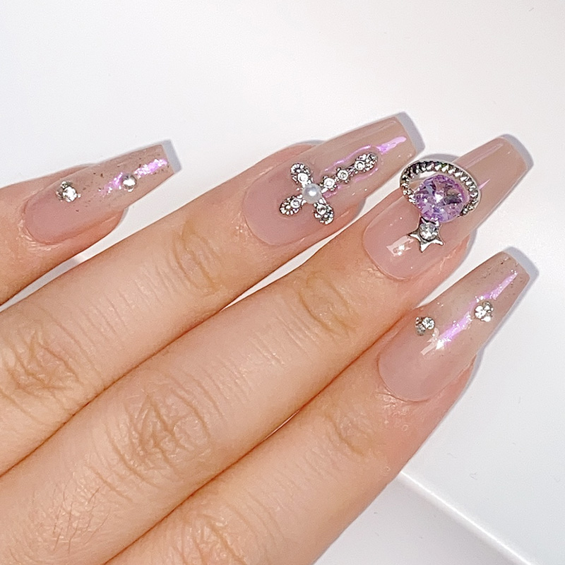 TSZS 10 ピース/ロット金属小さな惑星ダイヤモンドネイ - Nail Art Lotso のレビューと価格