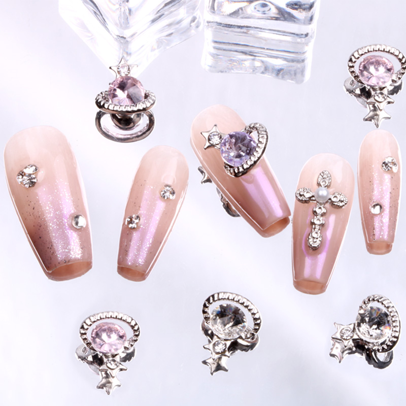 TSZS 10 ピース/ロット金属小さな惑星ダイヤモンドネイ - Nail Art Lotso のレビューと価格